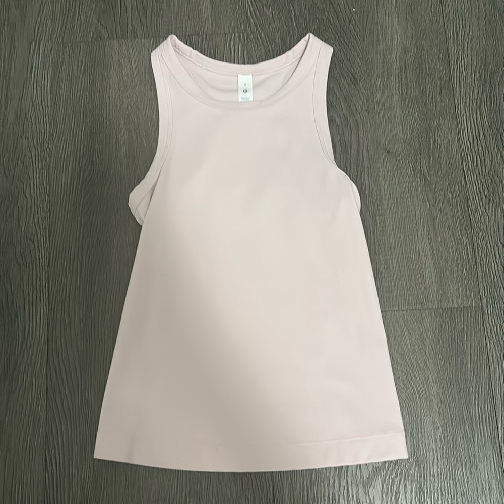 Lululemon athletic cropped pink tank top.